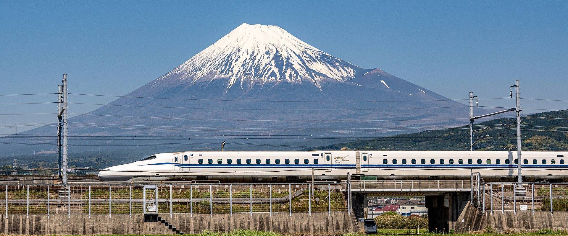 An N700S Shinkansen passing below Mount Fuji